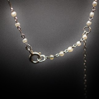 Collier en Platine vers 1920 avec perles fines . Collier en Platine vers 1920 avec perles fines .