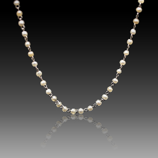 Collier en Platine vers 1920 avec perles fines . Collier en Platine vers 1920 avec perles fines .