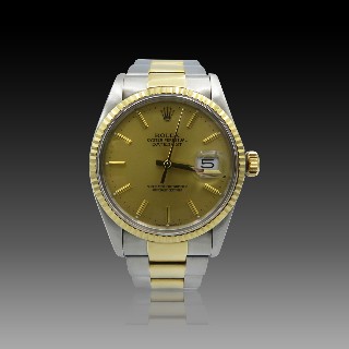 Montre Rolex Oyster Datejust en Or jaune 18k et Acier de 1983 .   