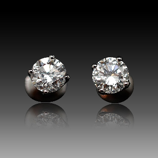 Puces d'oreilles Or gris 18k avec Diamants brillants 1.04 Cts et 1.01 Cts. E-VS2