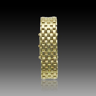 Montre Boucheron "Reflet" homme grand modèle à quartz en or jaune 18k . Montre Boucheron "Reflet" homme grand modèle à quartz en or jaune 18k .