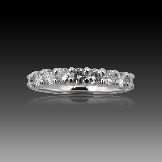 Demi Alliance or gris 18k avec 0,65 Cts de Diamants Brillants . Taille 53.