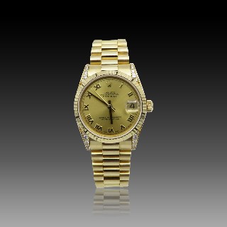 Montre Rolex Oyster Datejust Médium Or 18k Massif de 2010 et diamants. Cadran jaune. Ref : 68238 .