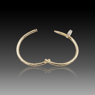 Bracelet Cartier "Juste un clou" en Or rose 18k avec diamants  brillants. Taille 15