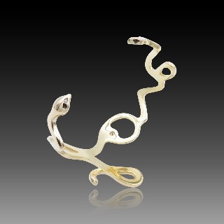 Bracelet rigide "Love" en or jaune 18 Cts avec diamants G/VS .poids : 28,30 grs