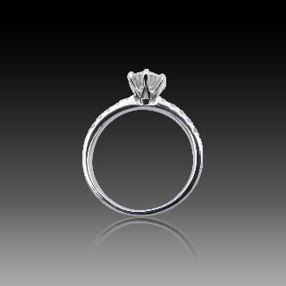 Solitaire en Or gris 18 Cts avec Diamant brillant 0,85 Cts E-VS2 + 0,18 Cts