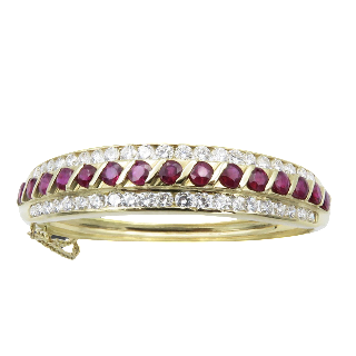 Bracelet Jonc ouvrant  en Or 18k avec Rubis et Diamants.