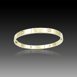 Bracelet Cartier Love 4 Diamants vers 2010 Or jaune 18K . Taille 19 .