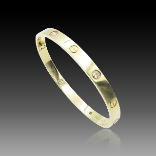 Bracelet Cartier Love 4 Diamants vers 2010 Or jaune 18K . Taille 19 .