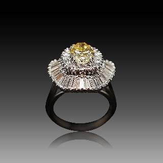 Bague en or gris 18k avec un Diamant Ovale Fancy de 2.29 Cts et + 2.50 Cts autour.