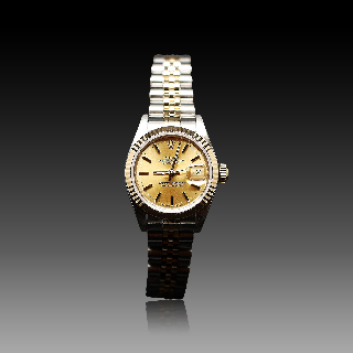 Montre Rolex Oyster Datejust Dame en Or & Acier de 1991. Cadran jaune. Ref : 69173 . Montre Rolex Oyster Datejust Dame en Or & Acier de 1991. Cadran jaune. Ref : 69173 .