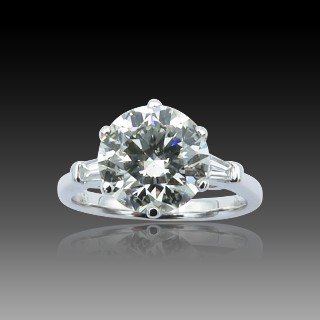 Solitaire en Or gris 18 Cts avec Diamant brillant 2,39 Cts I-SI2 + 0.15 Cts.