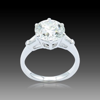 Solitaire en Or gris 18 Cts avec Diamant brillant 2,39 Cts I-SI2 + 0.15 Cts.