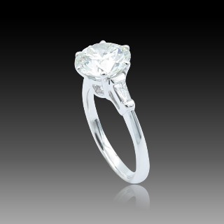 Solitaire en Or gris 18 Cts avec Diamant brillant 2,39 Cts I-SI2 + 0.15 Cts.