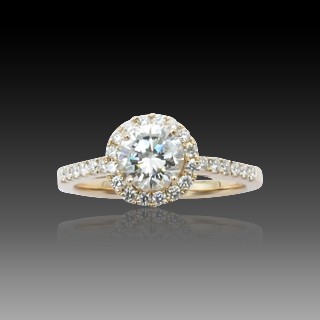 Solitaire en Or rose 18 Cts avec Diamant brillant 0.68 Cts E-VS1 + 0.24 Cts.