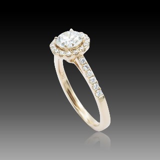 Solitaire en Or rose 18 Cts avec Diamant brillant 0.68 Cts E-VS1 + 0.24 Cts.