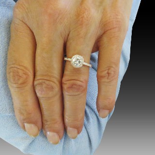 Solitaire en Or rose 18 Cts avec Diamant brillant 0.68 Cts E-VS1 + 0.24 Cts.