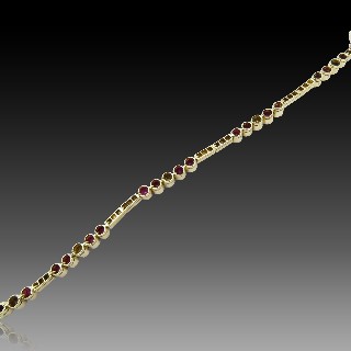 Bracelet articulé en or jaune 18 Cts avec Diamants et Rubis