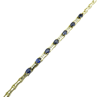 Bracelet articulé en or jaune 18 Cts avec Diamants et Saphirs