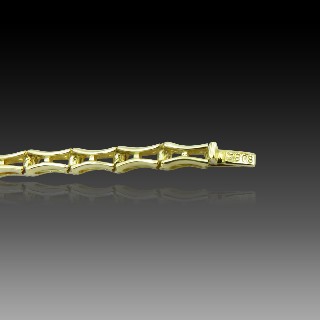 Bracelet articulé en or jaune 18 Cts avec Diamants et Saphirs