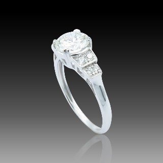 Solitaire en Or gris 18 Cts avec Diamant brillant 1,16 Cts H-VS2 + 0,12 Cts