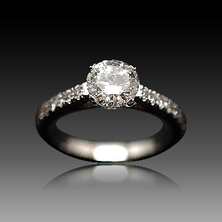 Solitaire Diamant 1.04 Cts G-VS2 en Or 18 Cts + 0.35 Cts.