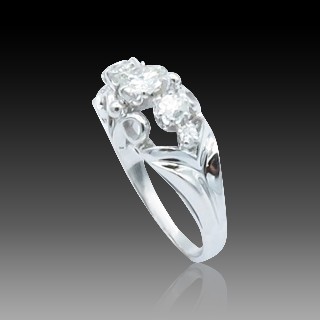 Bague en Or 18k et platine vers 1965 avec 0.70 Cts de Diamants