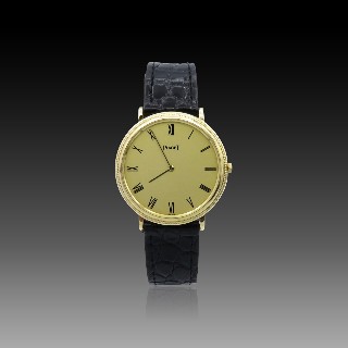 Montre Piaget Mixte Extraplate en Or jaune 18k Vers 1965. Mécanique . Montre Piaget Mixte Extraplate en Or jaune 18k Vers 1965. Mécanique .