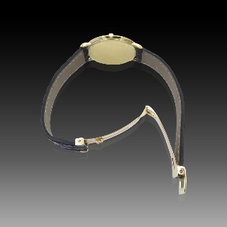 Montre Piaget Mixte Extraplate en Or jaune 18k Vers 1965. Mécanique . Montre Piaget Mixte Extraplate en Or jaune 18k Vers 1965. Mécanique .